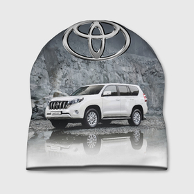 Шапка 3D с принтом Toyota Land Cruiser на фоне скалы в Тюмени, 100% полиэстер | универсальный размер, печать по всей поверхности изделия | car | off road vehicle | rock | toyota | автомобиль | внедорожник | скала | тойота